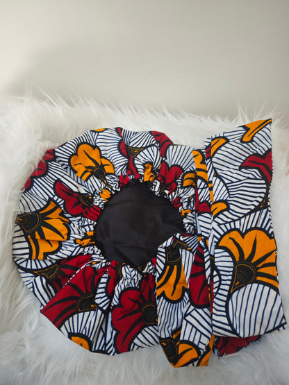 Muts met waxprint - Happy