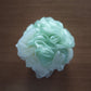 boule de douche exfoliant en polypropylène vert mon panier afro