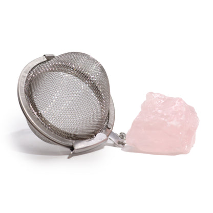 Infuseur à thé de pierres précieuses en cristal brut - Quartz rose, où l'élégance rencontre la fonctionnalité. Fabriquées avec soin et précision, ces passoires à thé sont conçues pour améliorer toute expérience de consommation de thé tout en ajoutant une touche de beauté naturelle au rituel quotidien. 